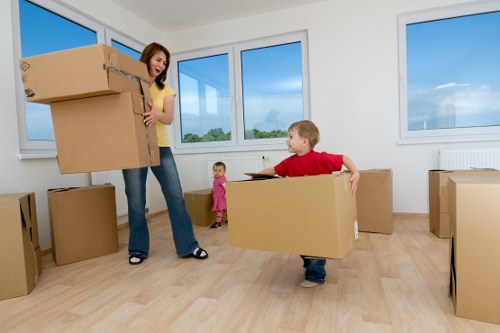 Professional movers handling fragile items during small removals in Pettswood