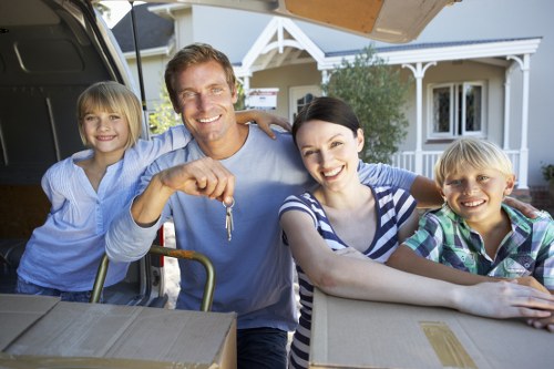 Professional flat removals planning in Pettswood with moving boxes and van