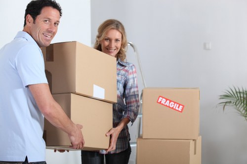 Efficient small removals team loading furniture for a local Pettswood move